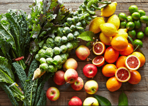 a group of fruits and vegetables on a wood surface Healthy Weight Loss Diets Edgbaston
